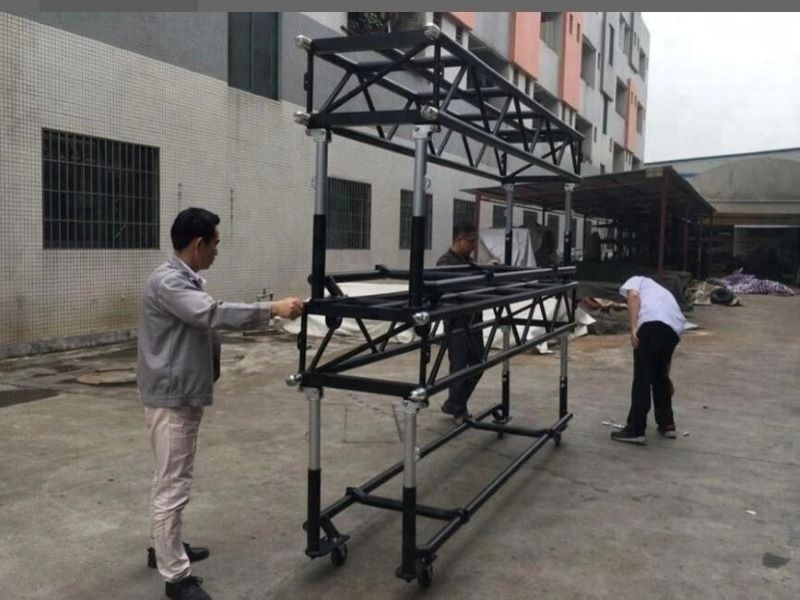 Pre-rig moving light truss